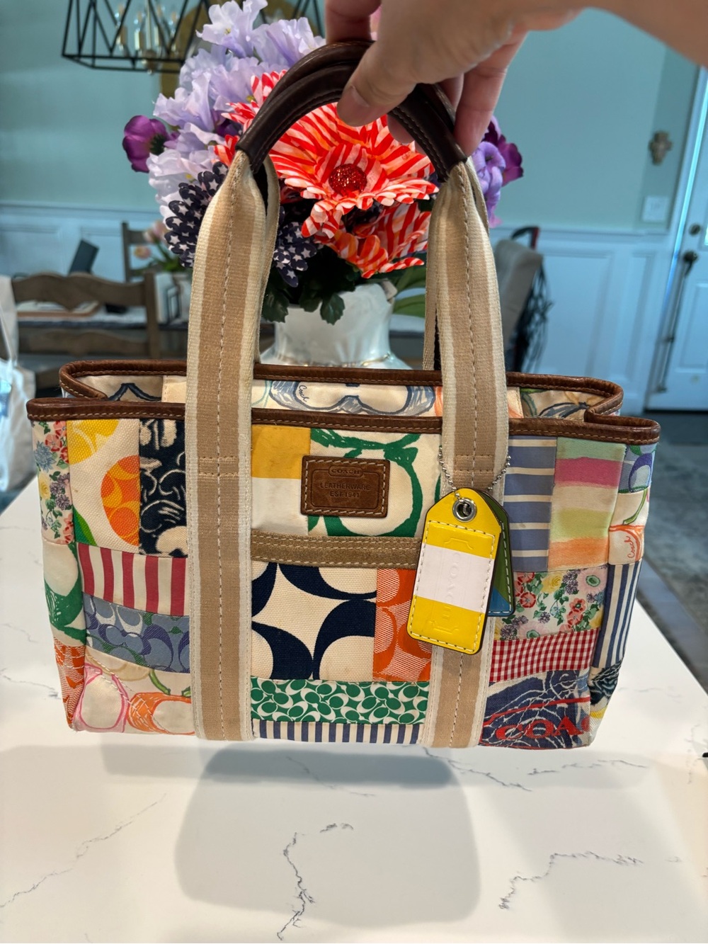 Coach Patchwork Canvas Tote with Yellow Accent Tag. A little rip at the bottom.